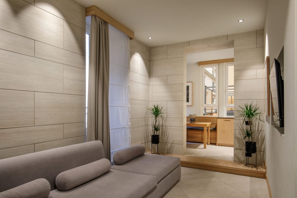Apartment, Terrace | Living area | 50-inch Smart TV with digital channels