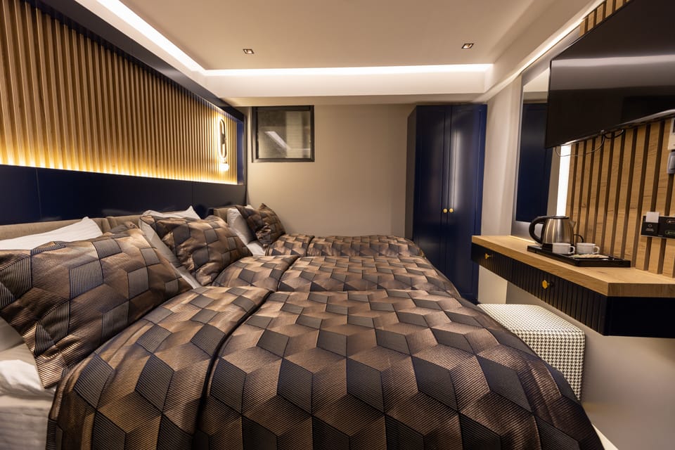 Economy Triple Room, No Windows | Minibar, soundproofing, free WiFi