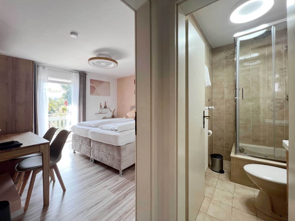 Classic Double Room, Balcony, Lake View | Hypo-allergenic bedding, minibar, in-room safe, individually decorated