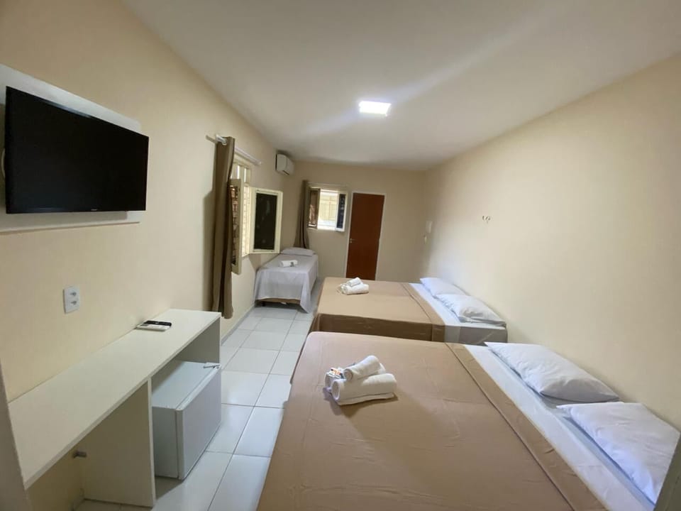 Family Room | Minibar, desk, free WiFi
