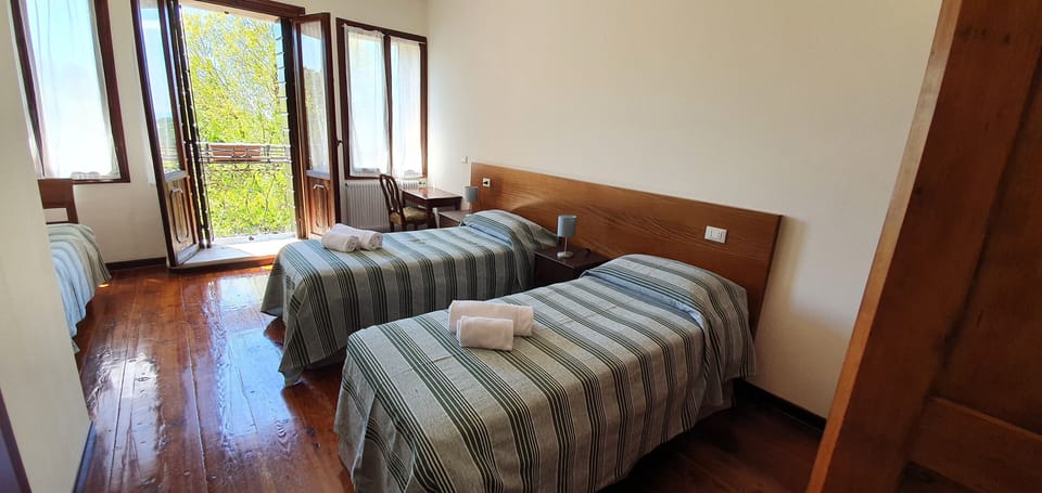 Triple Room | Down comforters, desk, laptop workspace, free WiFi