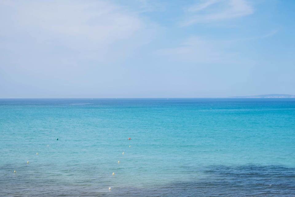 On the beach, white sand, beach towels