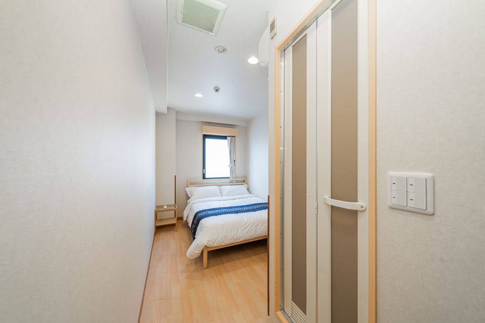 Business Double Room, 1 Double Bed, Non Smoking, Private Bathroom (Unable to check-in after 10pm) | Blackout drapes, bed sheets