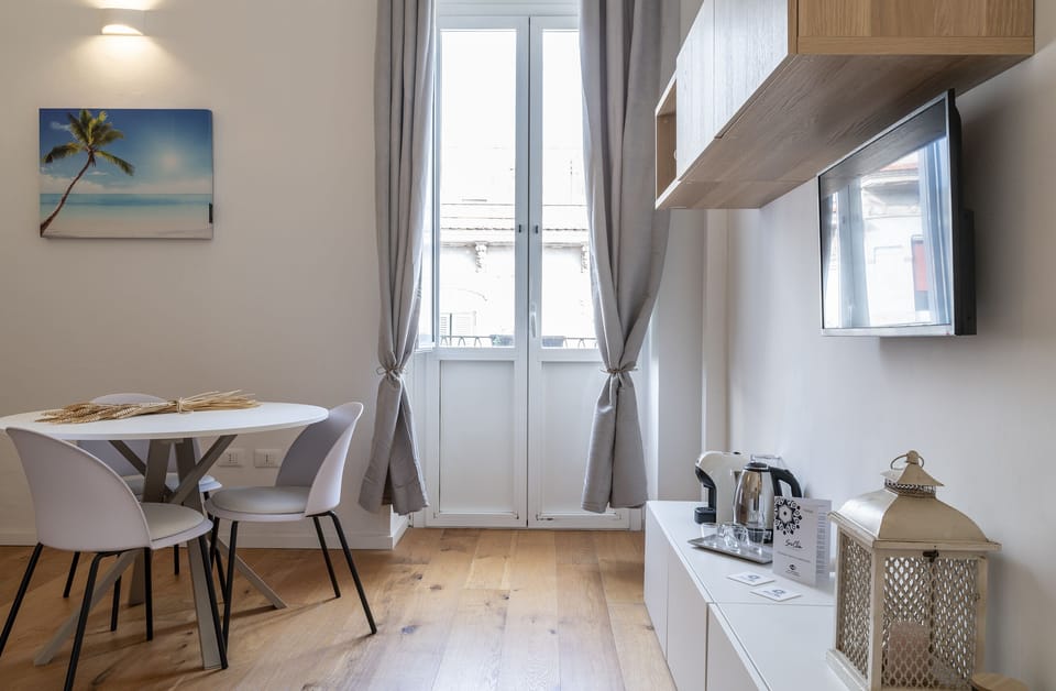 Deluxe Apartment, 2 Bedrooms, Private Bathroom, Executive Level | Living area | 24-inch Smart TV with digital channels