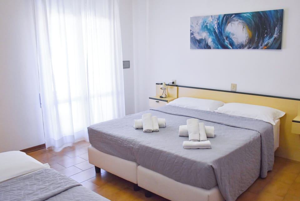 Triple Room, Balcony, Partial Sea View | WiFi (free), bed sheets