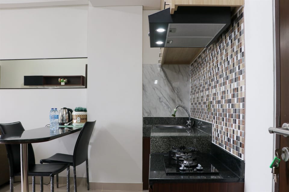 Apartment | Private kitchen | Fridge, stovetop, rice cooker, dining tables