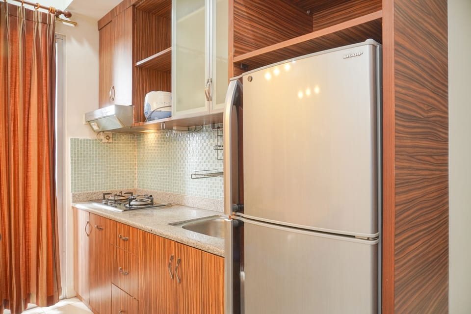 Apartment | Private kitchen | Fridge, stovetop, rice cooker, dining tables