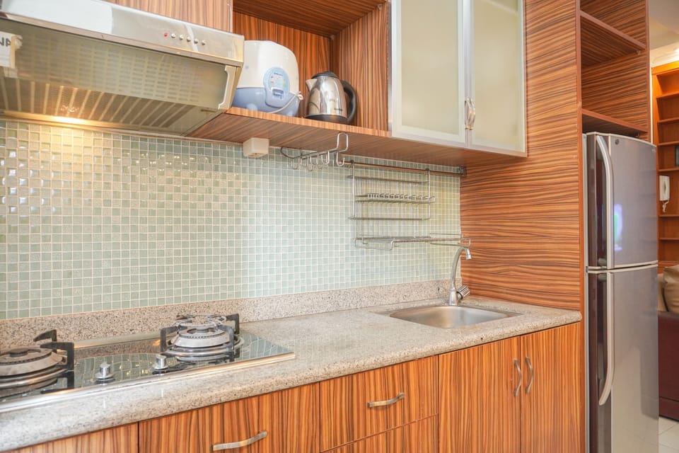 Apartment | Private kitchen | Fridge, stovetop, rice cooker, dining tables