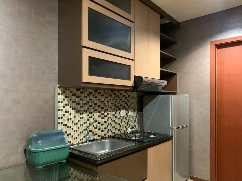 Apartment | Private kitchen | Fridge, stovetop, rice cooker, dining tables