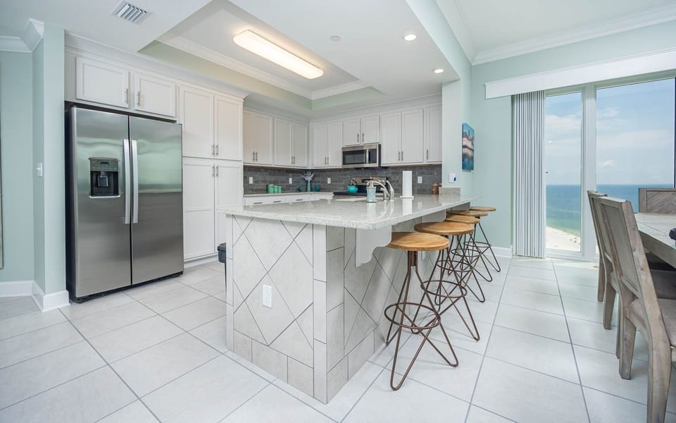 Condo, 4 Bedrooms | Private kitchen | Fridge, oven, coffee/tea maker