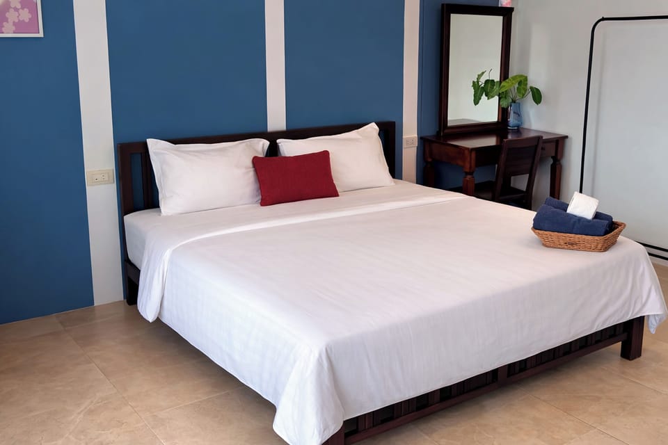Deluxe Room, 1 King Bed | In-room safe, desk, blackout drapes, iron/ironing board