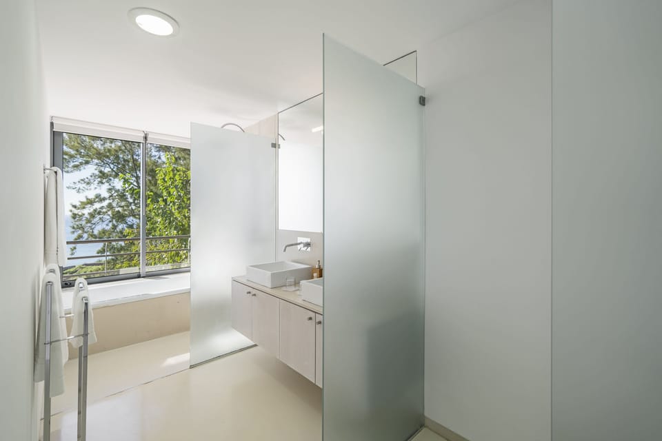 Apartment, 1 Bedroom, Ocean View | Bathroom | Shower, hair dryer, towels