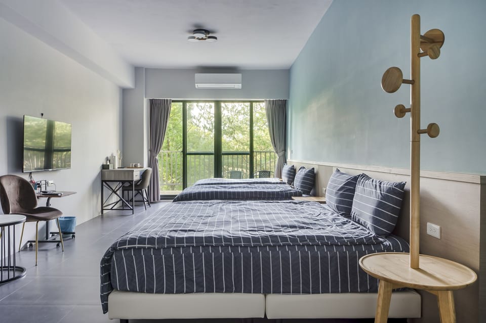 Quadruple Room with Garden View | Blackout drapes, WiFi (free), bed sheets