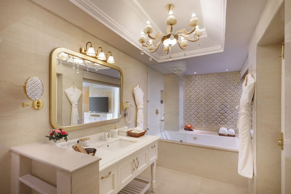 Combined shower/tub, deep soaking tub, rainfall showerhead, hair dryer
