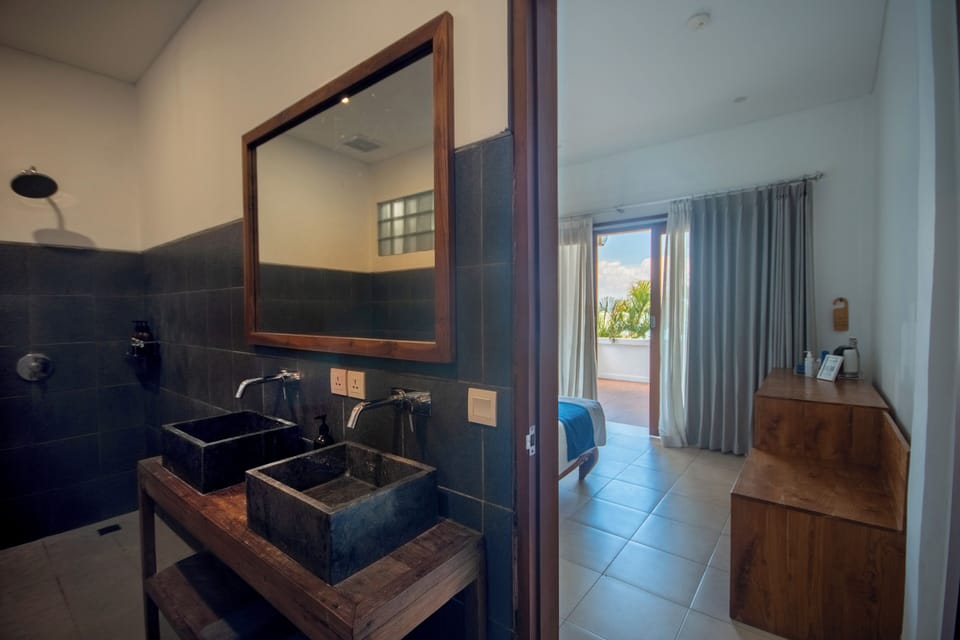 Standard Double Room, Patio, Partial Ocean View | Bathroom | Towels, soap, shampoo, toilet paper