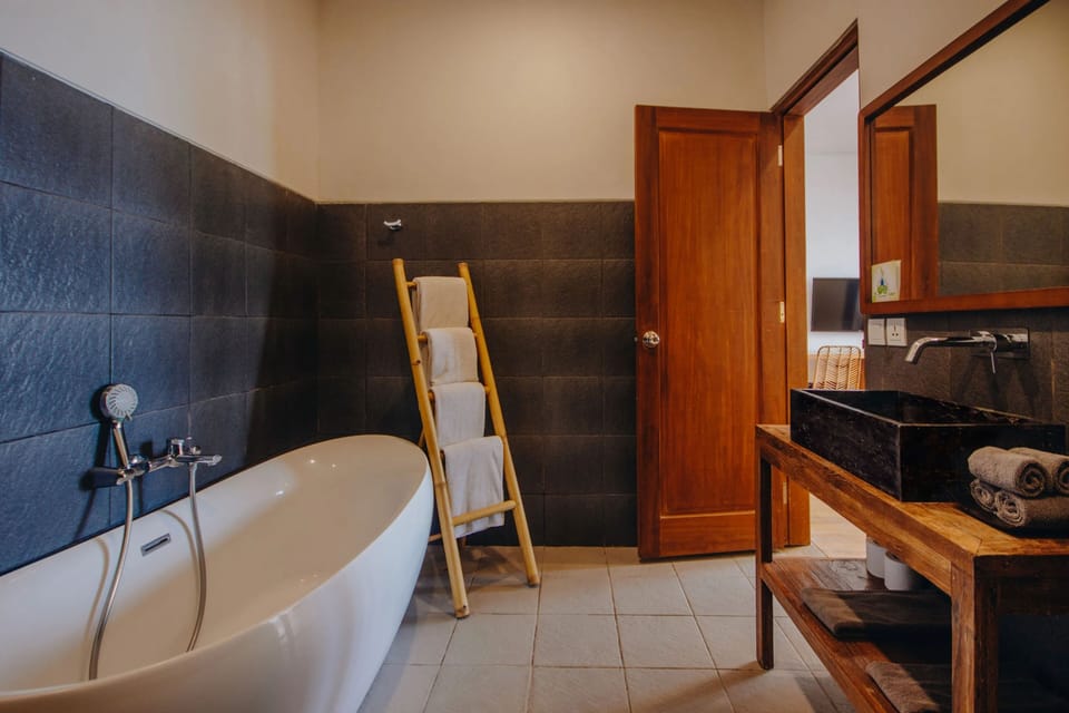 Superior Room, Patio, Partial Ocean View | Bathroom | Towels, soap, shampoo, toilet paper