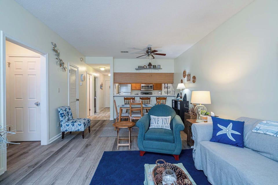 Condo, Multiple Beds, Balcony, Garden View (Fun Times) | Living area | 42-inch flat-screen TV with digital channels