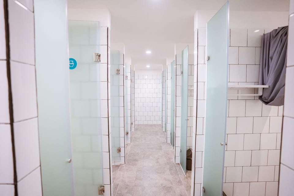 Shower, free toiletries, hair dryer, slippers
