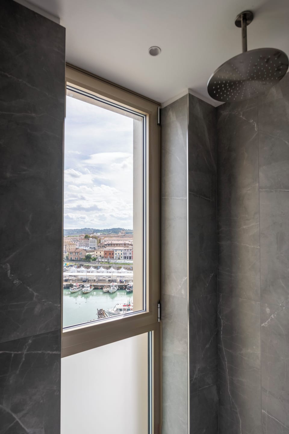 Junior Suite | Bathroom | Shower, rainfall showerhead, designer toiletries, hair dryer
