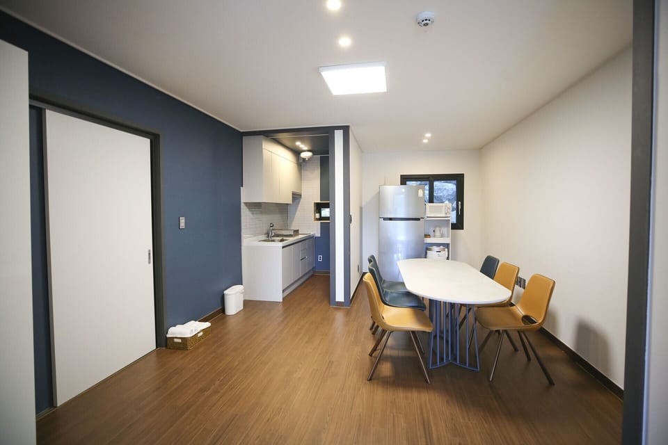 Elsa's House 1F | Living area | 60-inch flat-screen TV with cable channels, heated floors