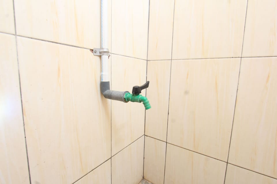Economy Double Room | Bathroom | Shower, towels, soap