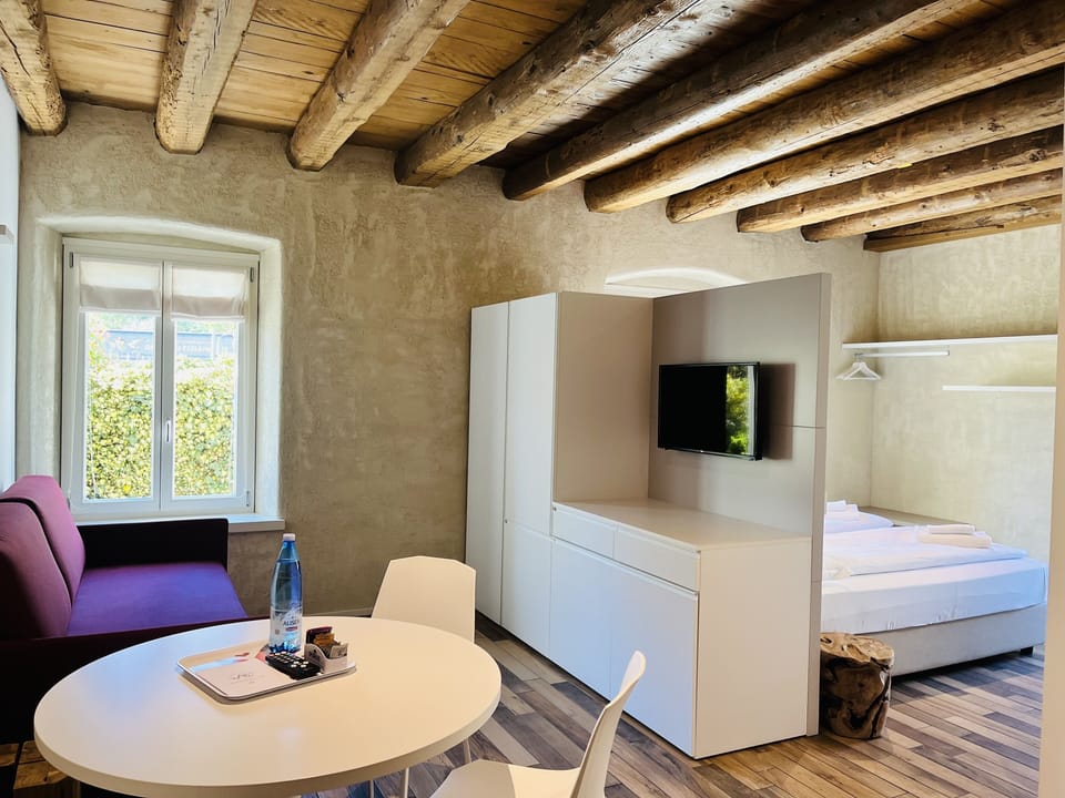 Studio | Premium bedding, down comforters, desk, blackout drapes