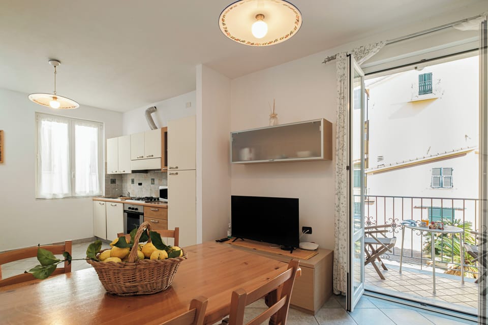 Apartment, 2 Bedrooms, Balcony (Mimosa) | Living area | 25-inch flat-screen TV with satellite channels, TV, DVD player