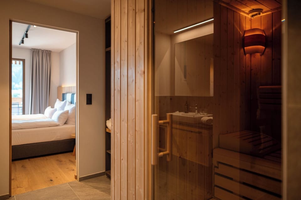 Comfort Apartment, 2 Bedrooms, Sauna, Mountain View | Hypo-allergenic bedding, in-room safe, laptop workspace, blackout drapes
