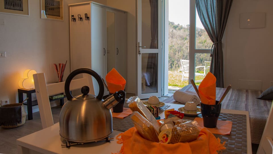 Traditional Studio | Premium bedding, pillowtop beds, blackout drapes, iron/ironing board