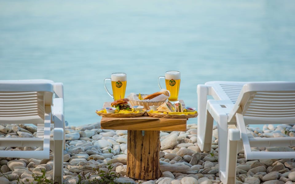 On the beach, sun loungers