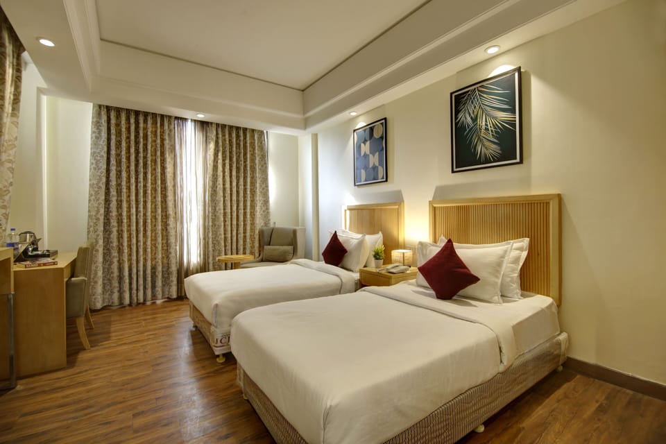 Superior Twin Room with City View | Premium bedding, in-room safe, desk, soundproofing