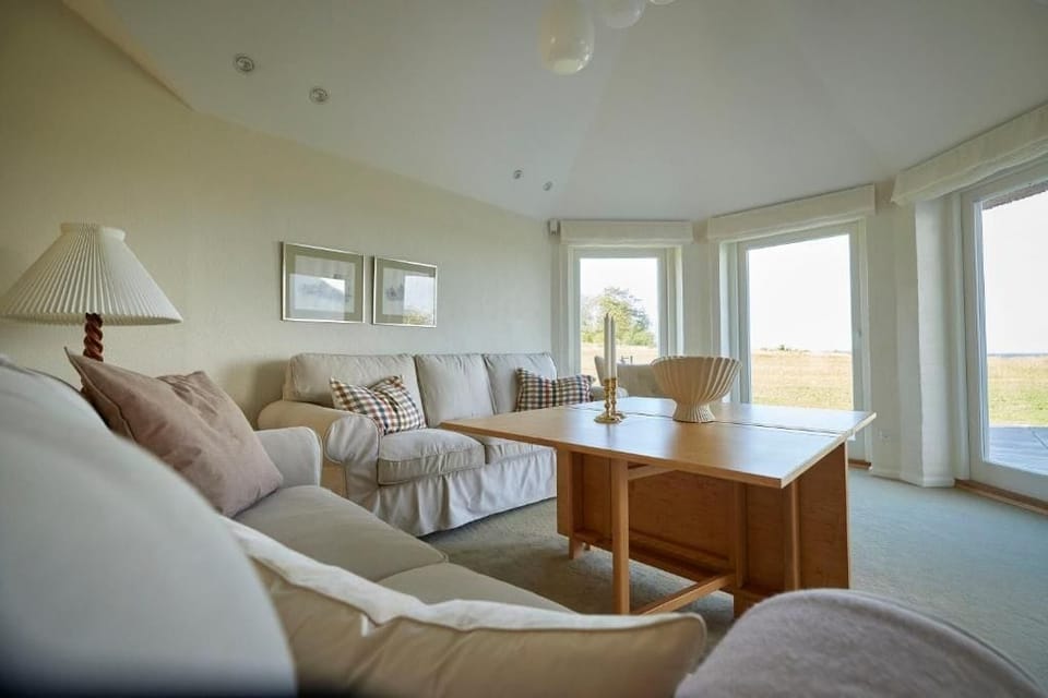 Deluxe Suite, Ocean View | Desk, laptop workspace, iron/ironing board, free WiFi
