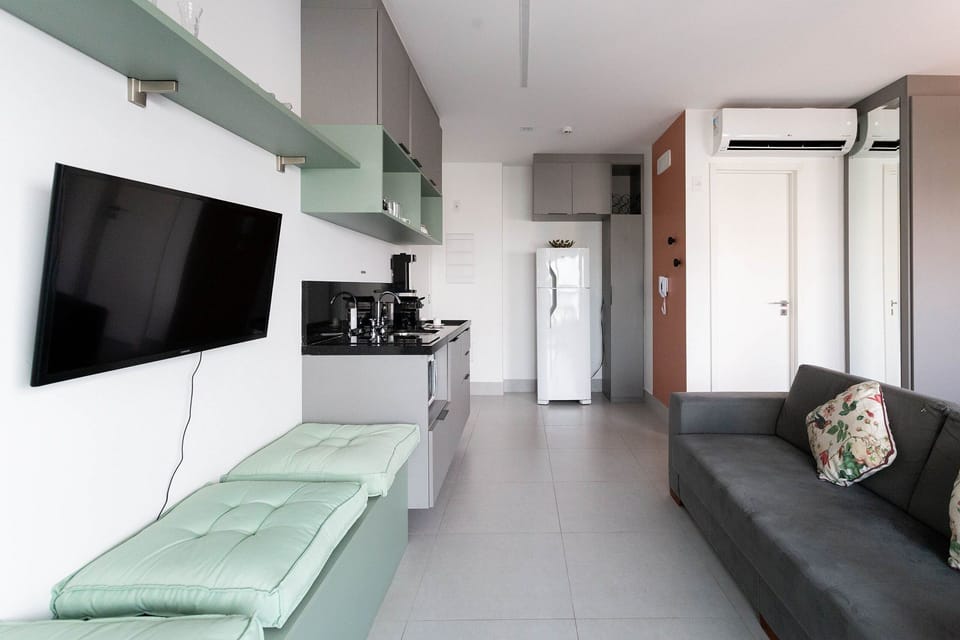 Studio 708 Haus Butantã | Living area | Flat-screen TV