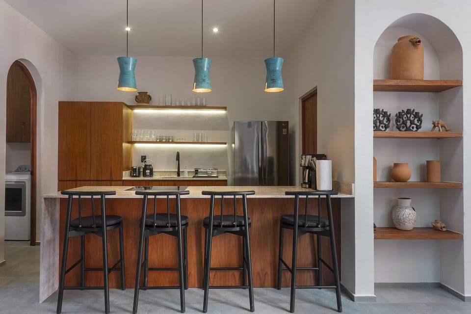 Deluxe Villa | Private kitchen | Full-size fridge, oven, blender, paper towels