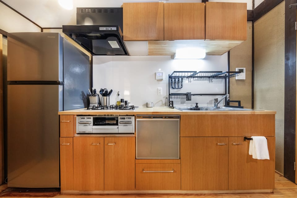 City House | Private kitchen | Full-size fridge, microwave, stovetop, electric kettle