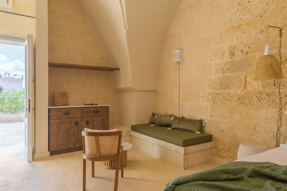 Deluxe Room with Patio | Premium bedding, down comforters, minibar, in-room safe
