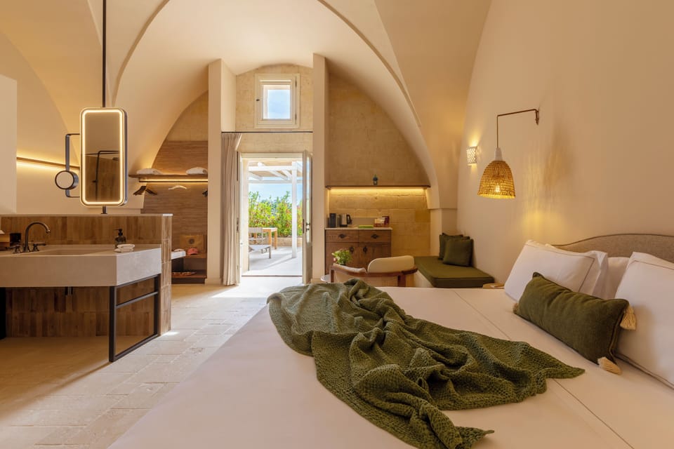 Deluxe Room, Patio | Premium bedding, down comforters, minibar, in-room safe
