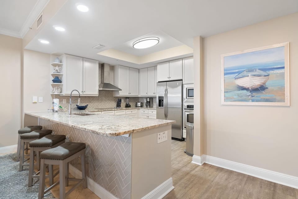 Condo, Multiple Beds (Indigo East 1702) | Private kitchen | Oven, toaster, paper towels