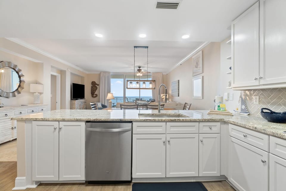 Condo, Multiple Beds (Indigo East 1702) | Private kitchen | Oven, toaster, paper towels