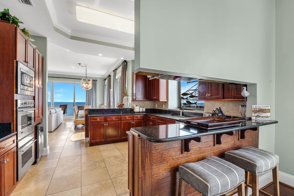 Condo, Multiple Beds (Indigo West 2103 Penthouse) | Private kitchen | Oven, toaster, paper towels