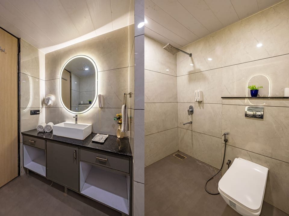 Executive Room | Bathroom | Hair dryer, slippers, towels