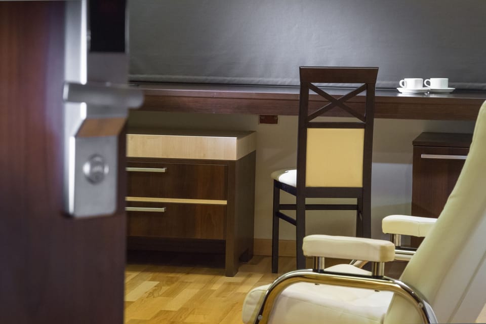 Standard Double Room, 1 Double Bed | Living area | 42-inch flat-screen TV with satellite channels, TV