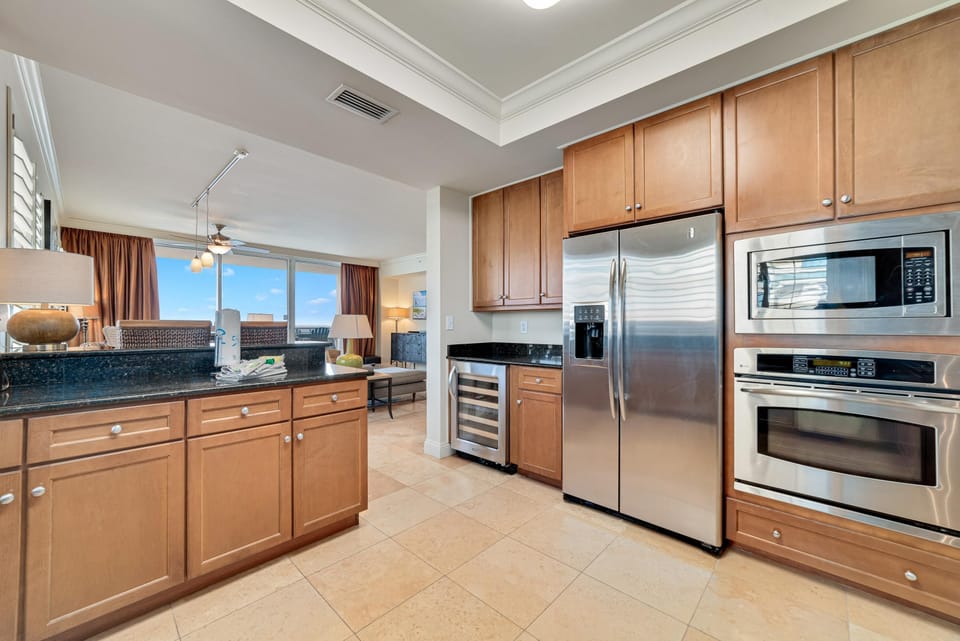 Condo, Multiple Beds (Indigo East 1801) | Private kitchen | Oven, toaster, paper towels