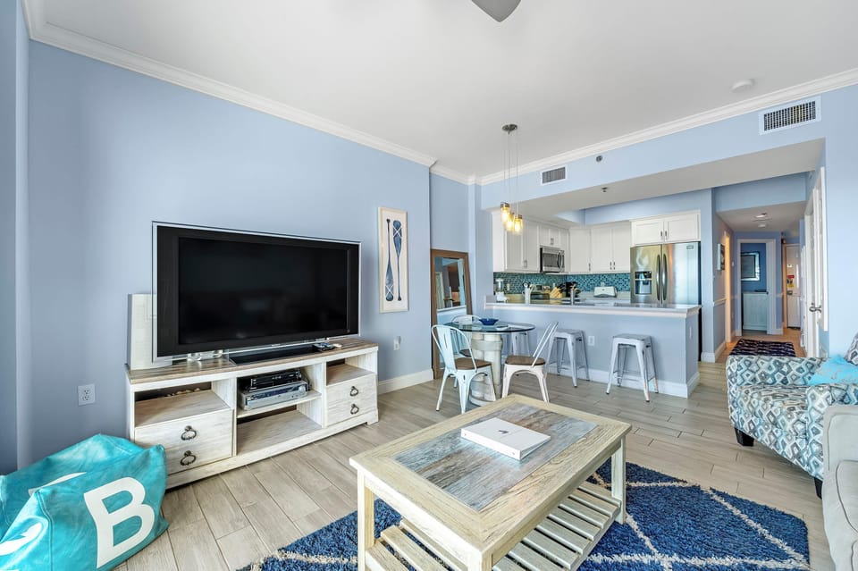 Condo, 1 King Bed with Sofa bed (Tidewater 706) | Living area | TV