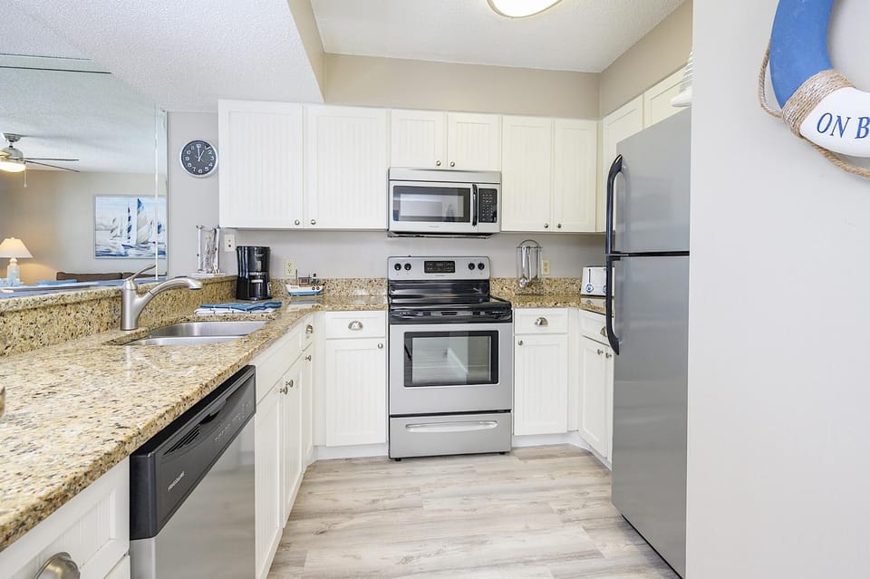 Condo, Multiple Beds (Pelican Beach Resort 308) | Private kitchen | Oven, toaster