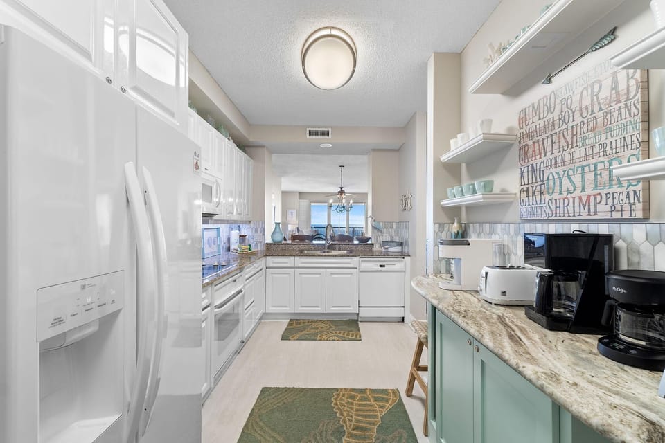 Condo, Multiple Beds (Beach Colony West 12B) | Private kitchen | Oven, toaster, paper towels