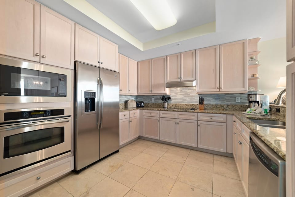 Condo, Multiple Beds (Indigo West 1803) | Private kitchen | Oven, toaster, paper towels
