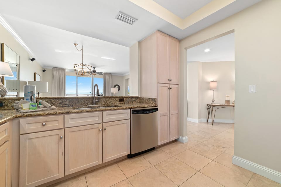 Condo, Multiple Beds (Indigo West 1803) | Private kitchen | Oven, toaster, paper towels