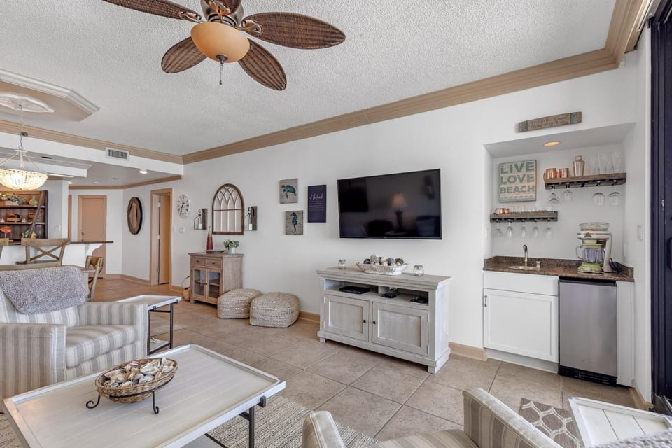 Condo, Multiple Beds (Eden West 504) | Living area | TV