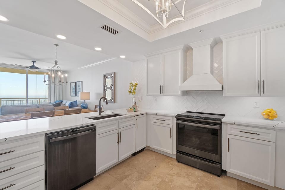 Condo, Multiple Beds (Indigo East 1502) | Private kitchen | Oven, toaster, paper towels